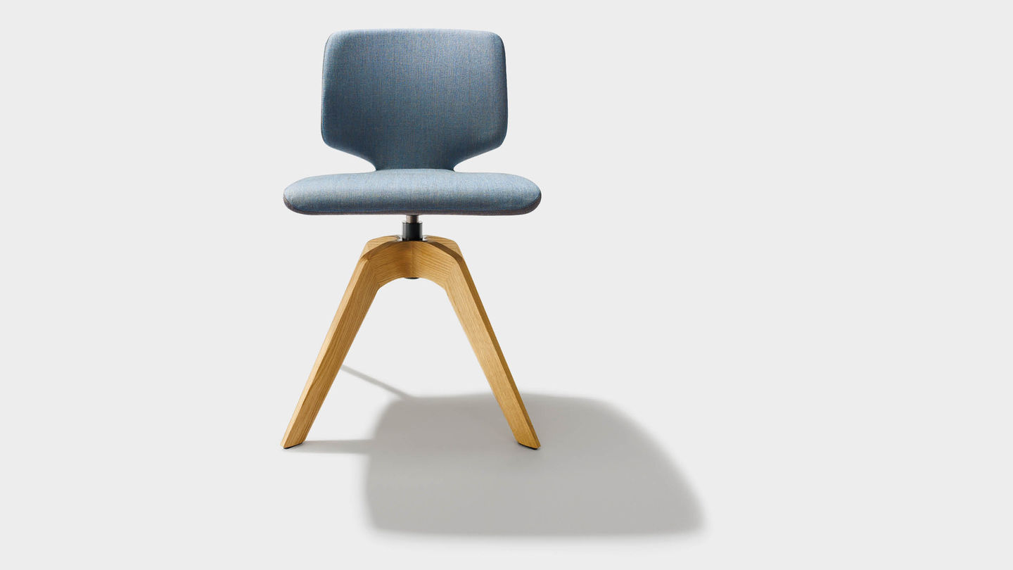 aye swivel chair in fabric with solid wood legs without armrests from front aye swivel chair in fabric with solid wood legs without armrests from front