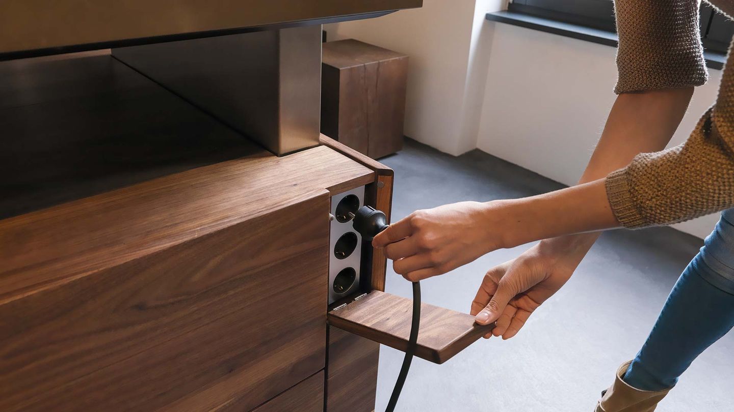 Isola di cottura k7 con prese di corrente integrate Isola di cottura k7 con prese di corrente integrate