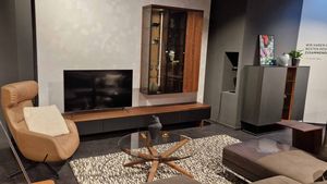 Team7-Dortmund-Exhibition-Slider-cubus-Living-Wall-Walnut TEAM 7 cubus wall unit in walnut natural oil with smoked glass in the TEAM 7 showroom in Dortmund