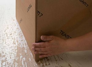 Custom-fitted cardboard packaging made from recycled waste paper. Custom-fitted cardboard packaging made from recycled waste paper.