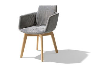 grand lui upholstered chair with armrests and striking folds by TEAM 7 grand lui upholstered chair with armrests and striking folds by TEAM 7